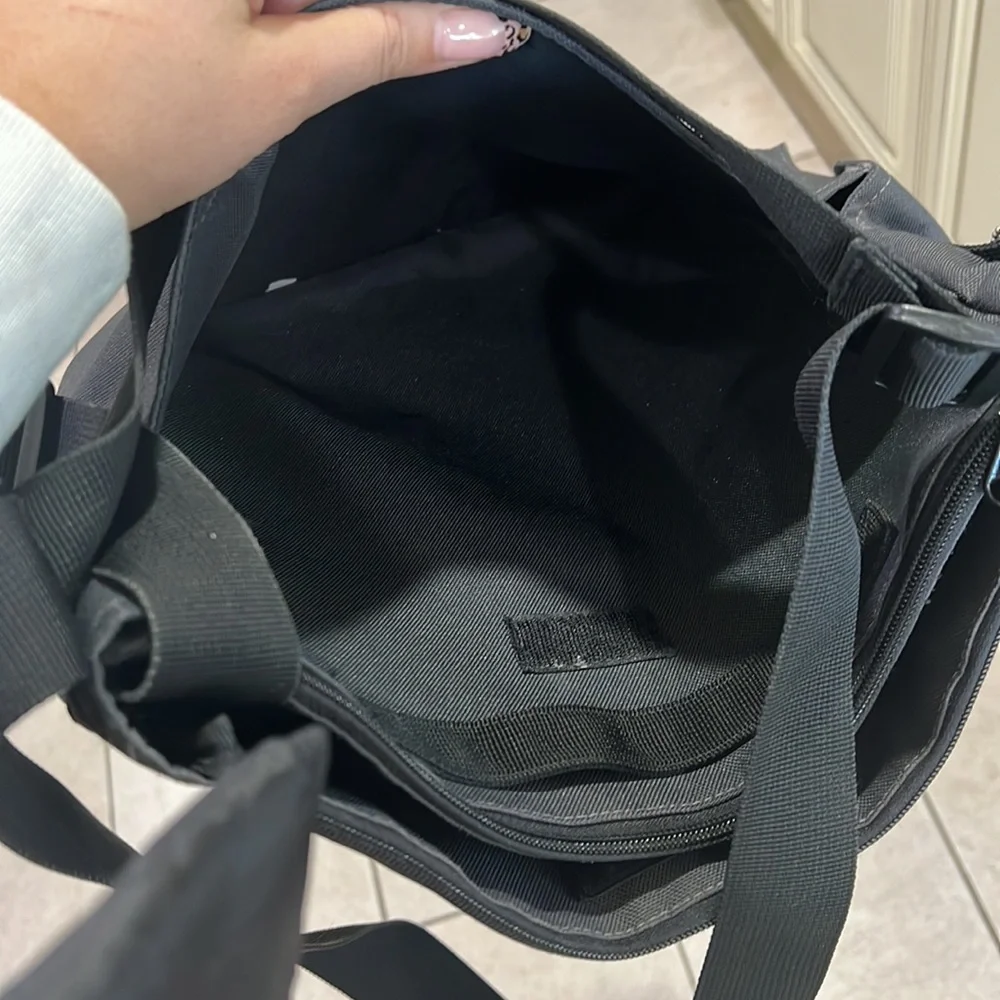 Skip hop diaper bag caddy with many compartments and changing pad